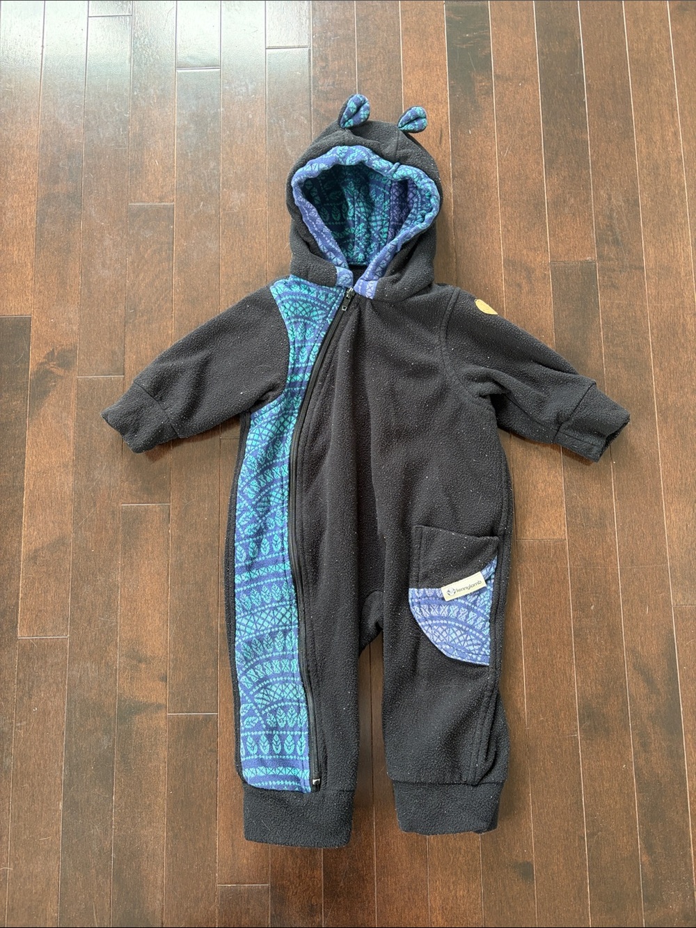Black Fleece One-Piece Bodysuit with Blue Patterned Trim